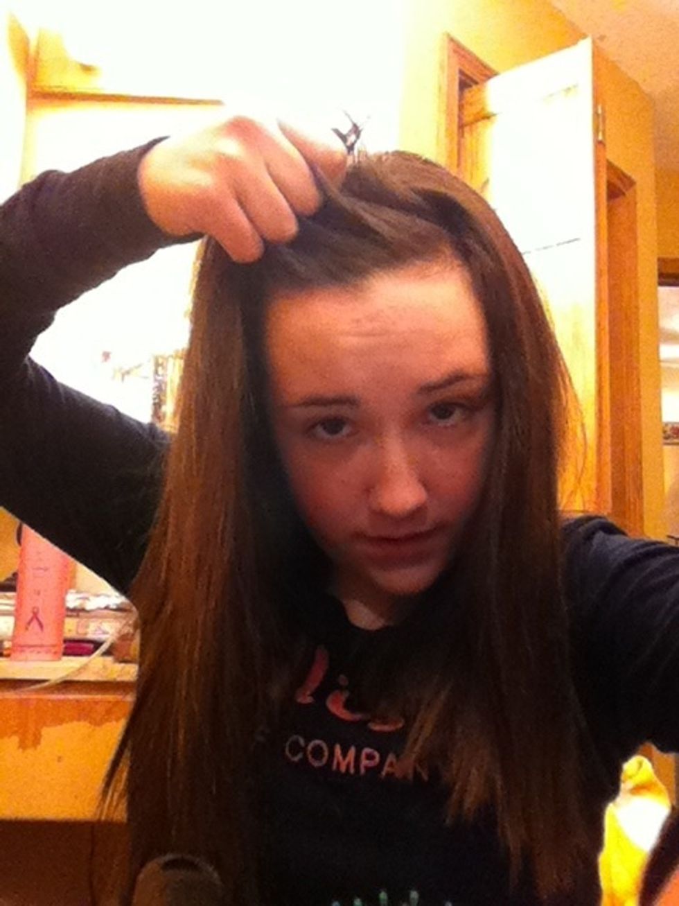 Then grab 3 sections of your hair as if you were Doing a regular braid