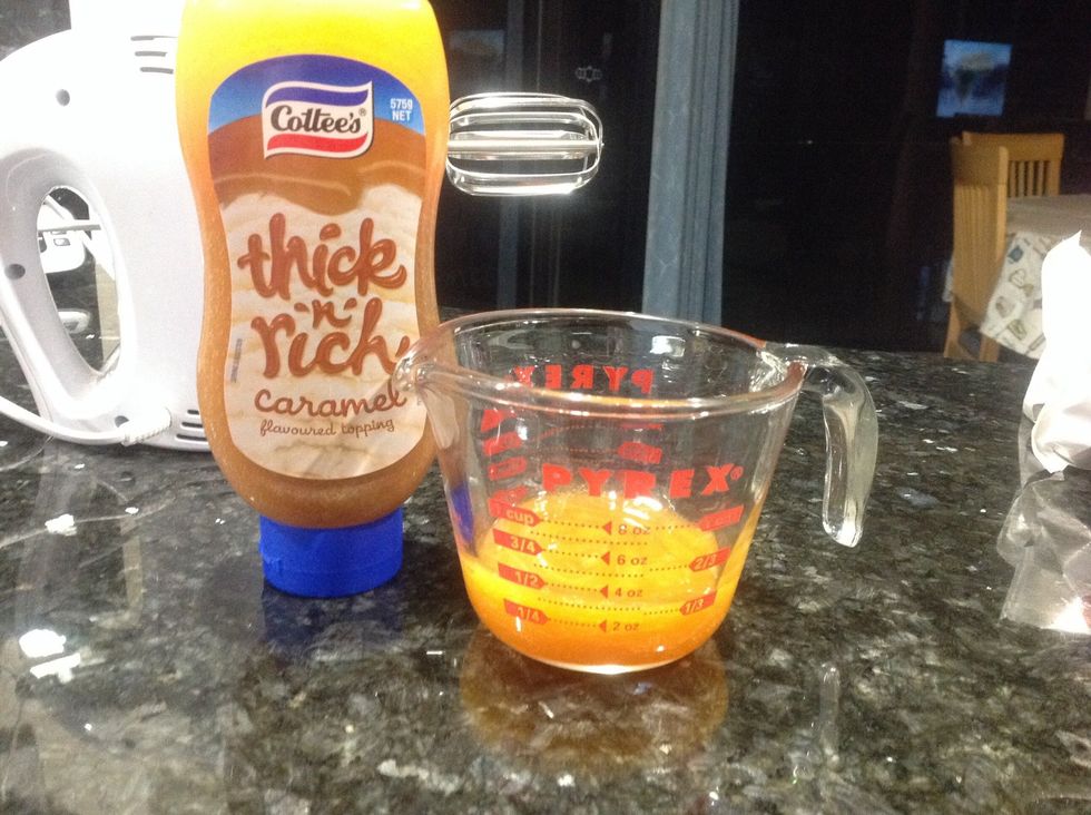 Then grab your Carmel sauce and get your measuring cup and put 1/3 of Carmel sauce in it.