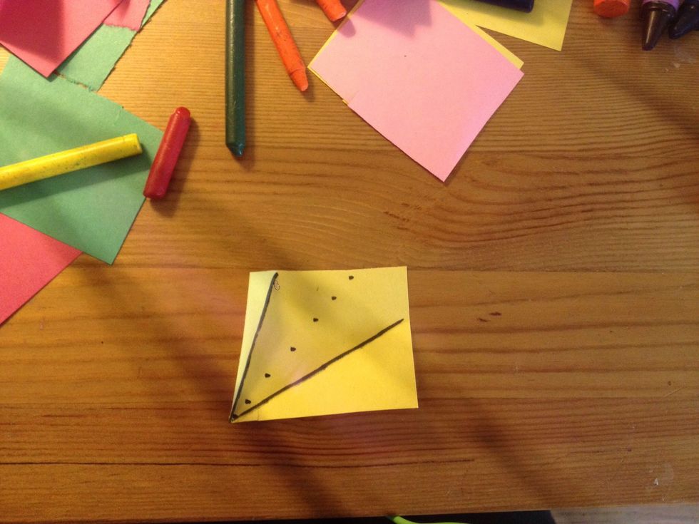 Then grab your second paper - fold on the solid lines to the bottom left corner