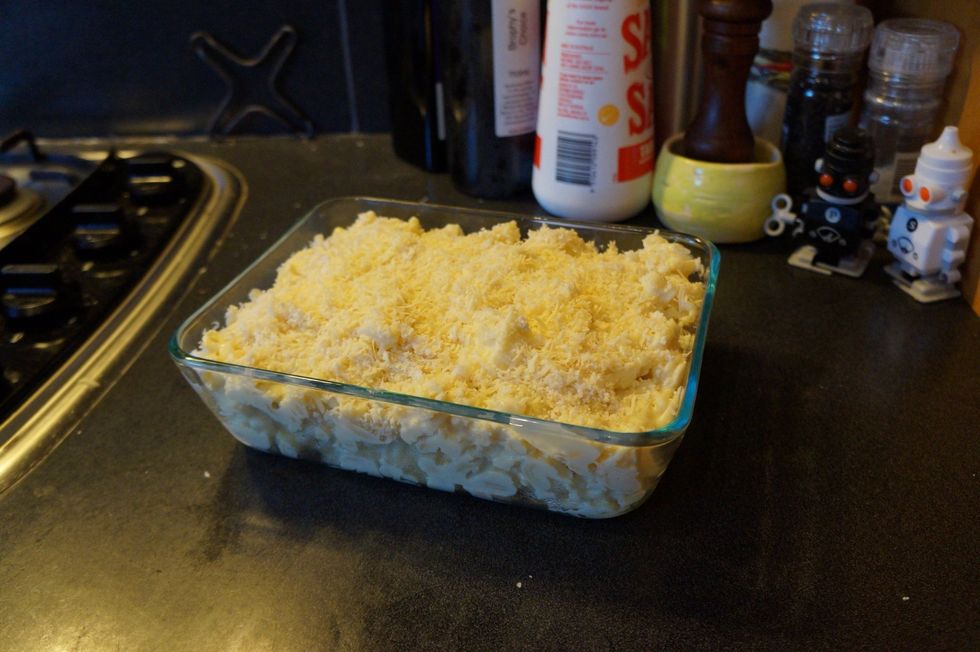 Then grate a bit of Parmesan cheese to give it of extra flavour