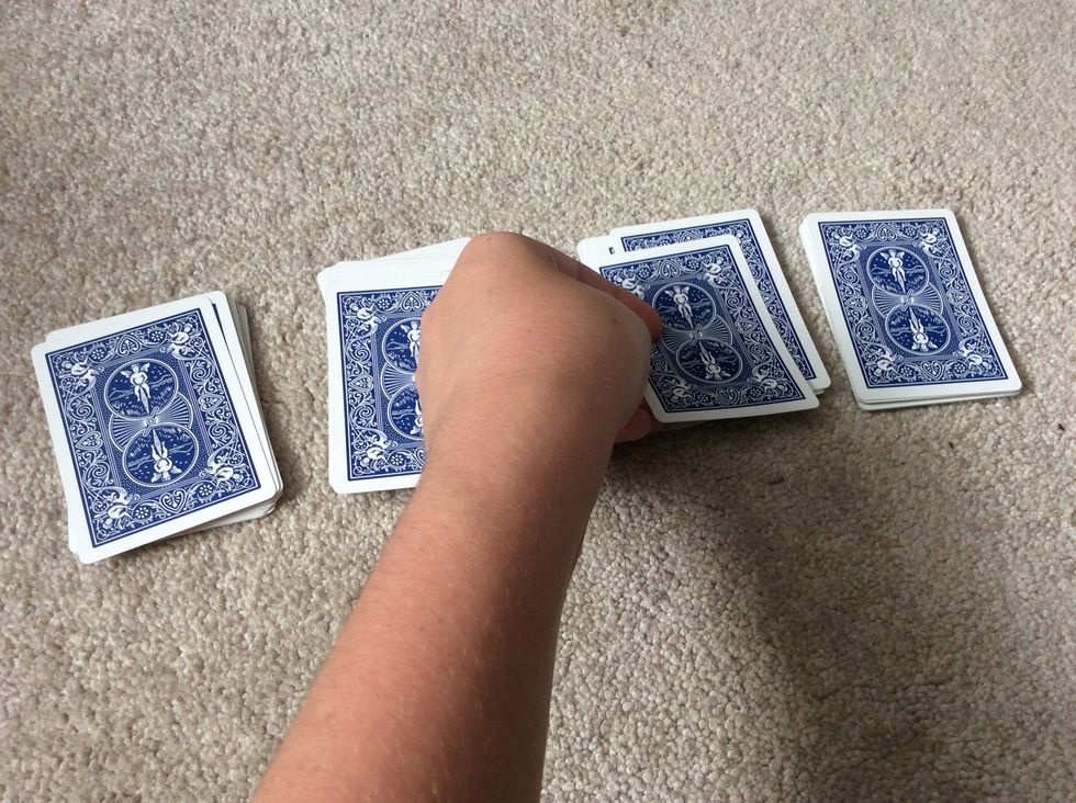 Then have them put it on the third pile