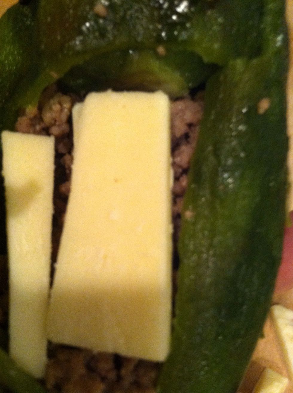 Then I add more cheese. So that I have cheese all over the inside. Stuff the rest of your chiles.