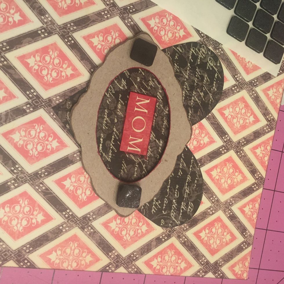 Then I added a chipboard frame, also form the Graphic 45 Mon Amour Collection. I added so foam dots and put in on top of the heart