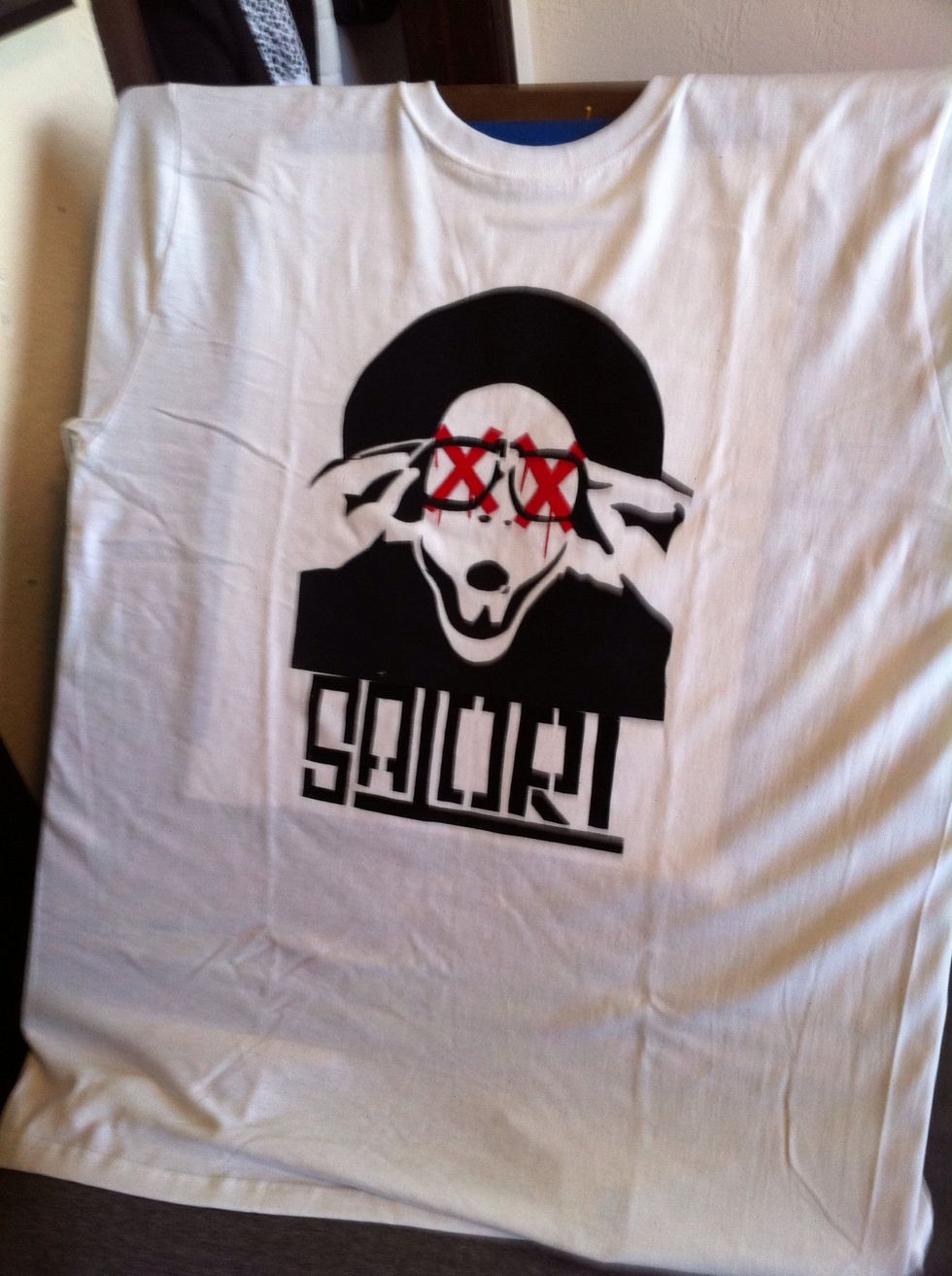 Then I added I added the last touch my name. I let it dry the ironed both side with an iron in between to set the ink.