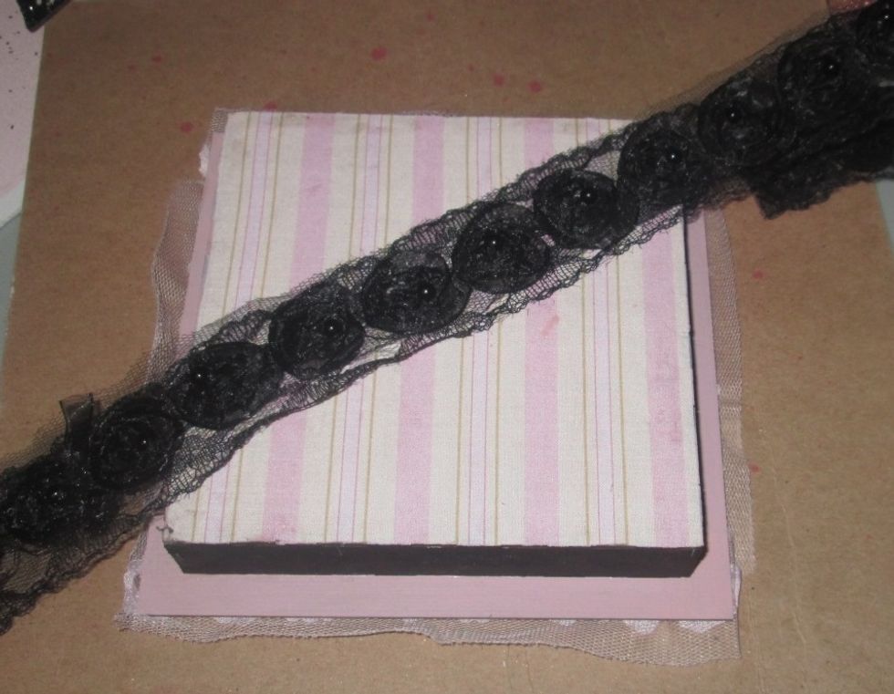 Then I added some more fabric to the back of the box and black trim for the outer part of the frame. I always like to have the back of a project as pretty as the front.