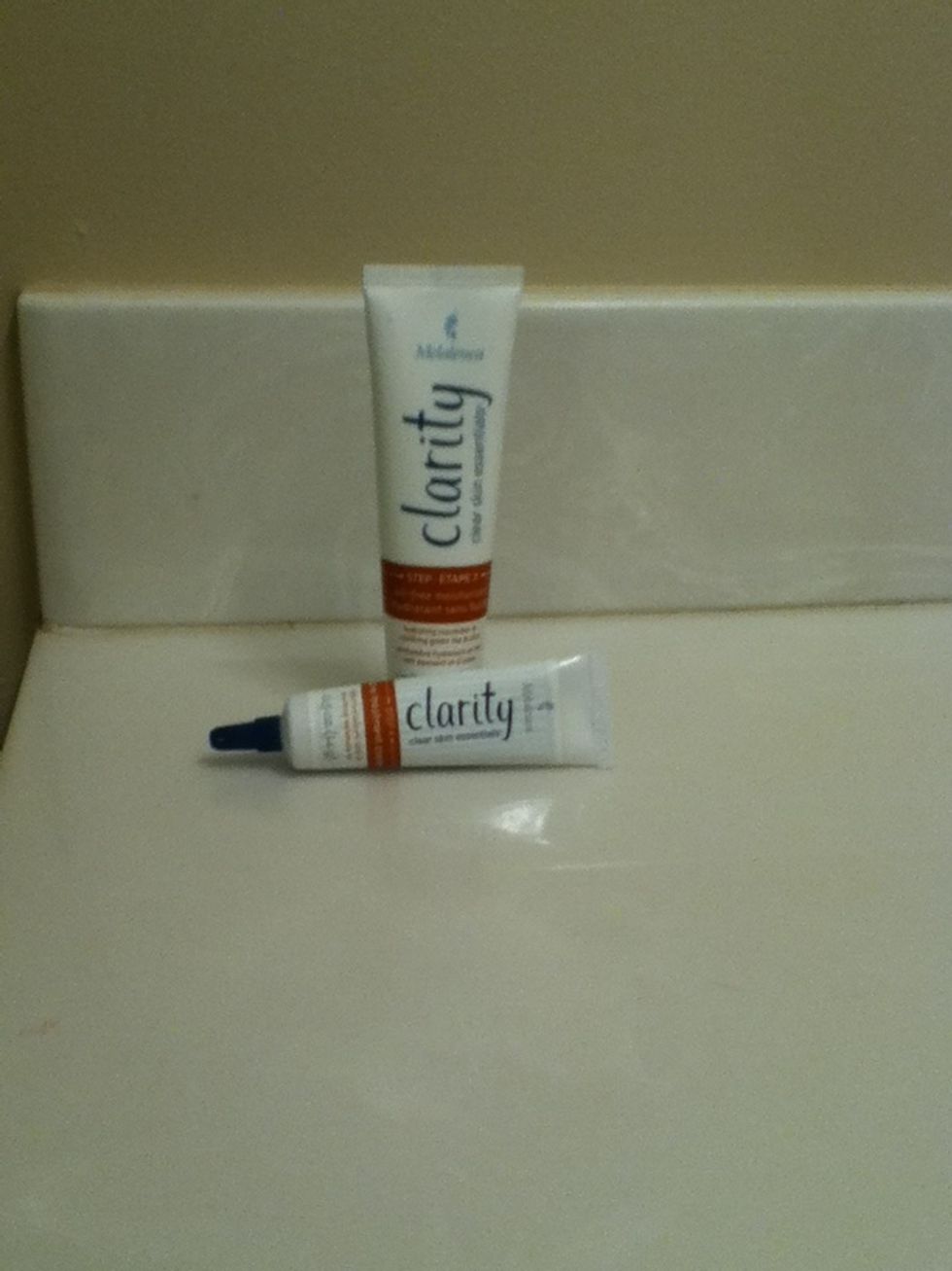 Then, I apply my moisturizer and if I am breaking out or if I have acne, I use the product on the bottom. I don't have acne so I usually don't use that.