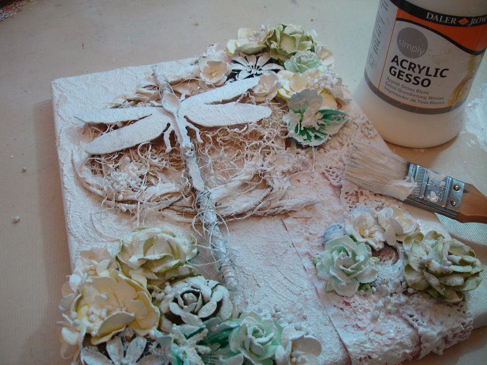 Then I brushed everything including canvas with Acrylic White Gesso. Once everything is covered with Gesso I used my heat dry tool.