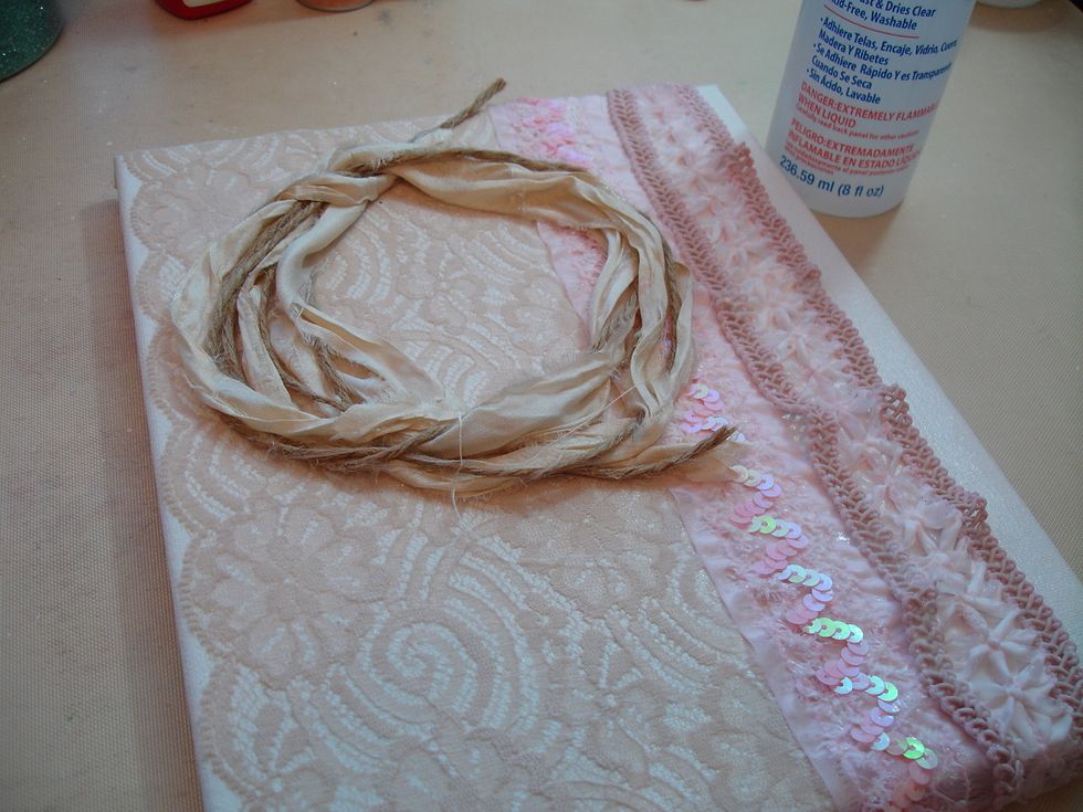 Then I coiled leftover trim and jute into a circle then adhered it with fabri-tac.