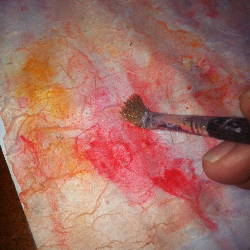 Then i kept wetting the brush and dabbing to flatten it out and bring the colours through