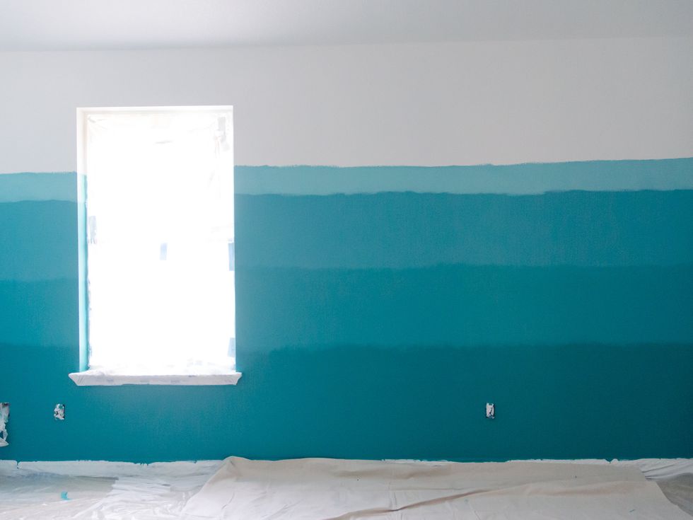 Then, I mixed my White on White paint and the Marine Blue in my other quart can to get a light blue. I painted it above the Marine Blue section.