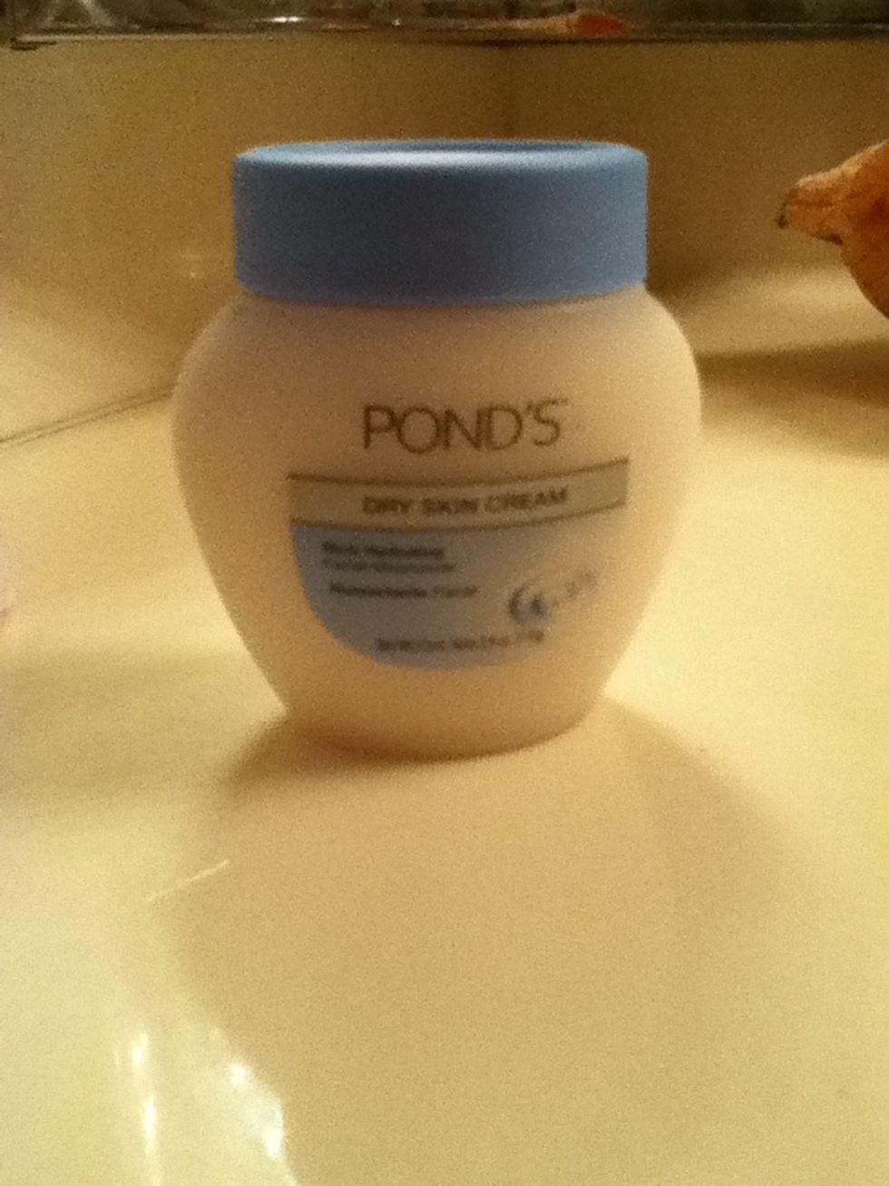 Then I moisturize my face with POND'S Dry Skin Cream.