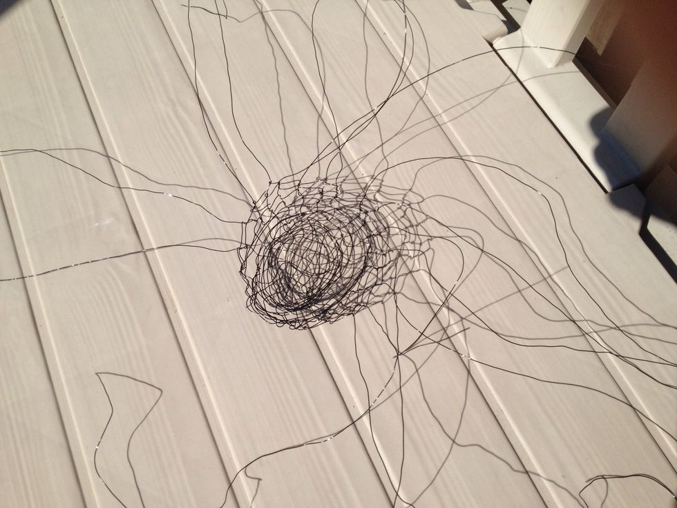 Then I needed something to hold the light bulb fittings in side the lampshade, I had an old test attempt on weaving a metal basket lying waiting just for this.