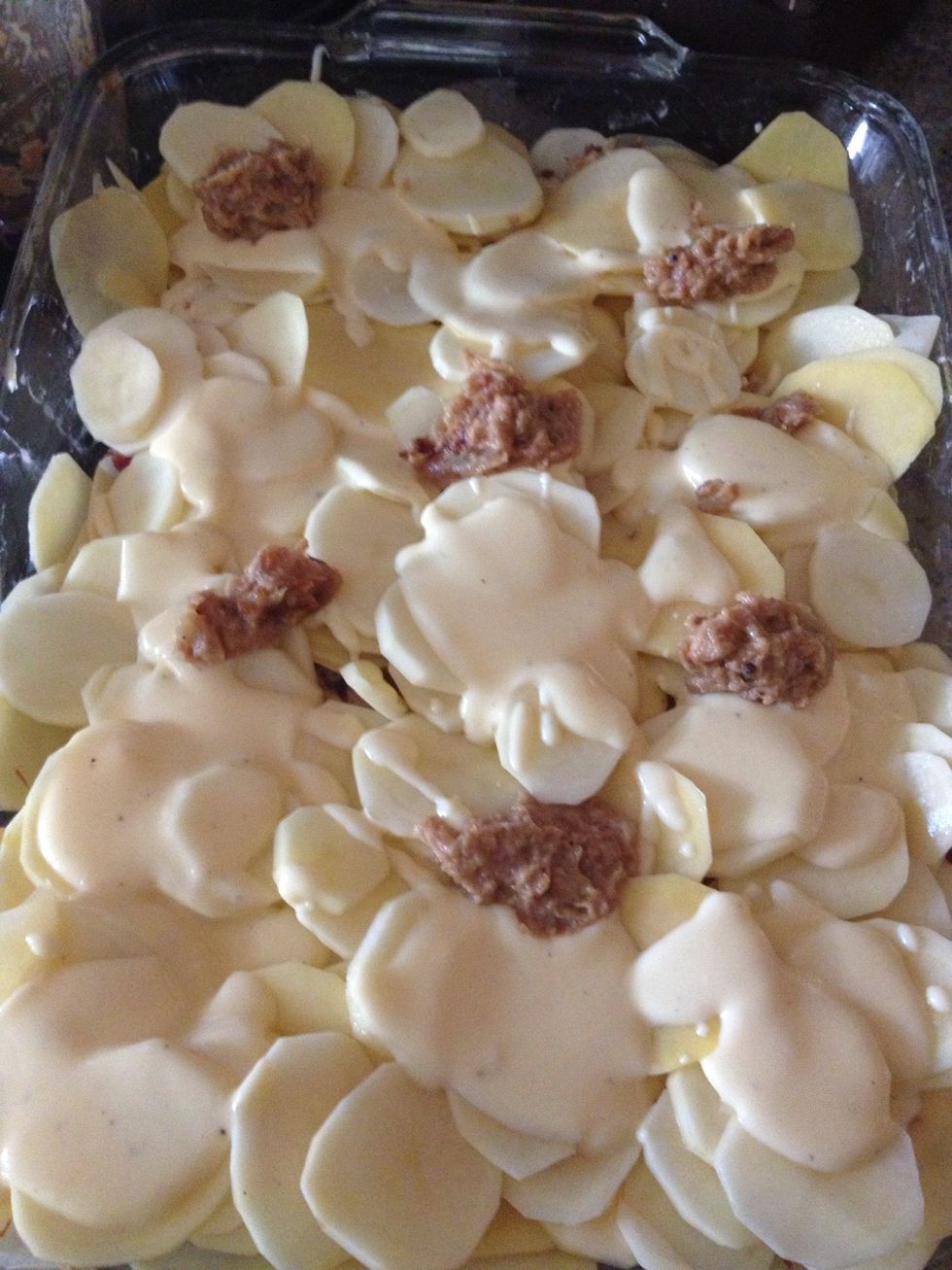 Then I put an optional Caramelized onion paste in dollops all across the cheese. This added a great flavor blend with the bacon and cheese. I caramelized the onions, then used the Magic Bullet for it.