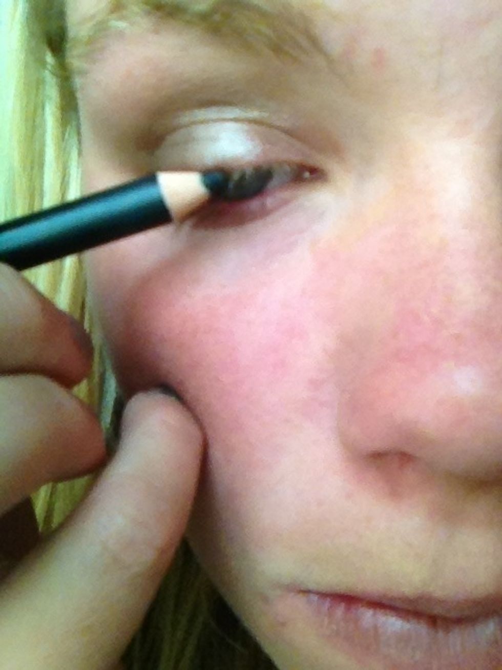 Then I put eyeliner. I start about half way into the Eyelid and then thicken as I get to the corner. Don't worry about it being messy.