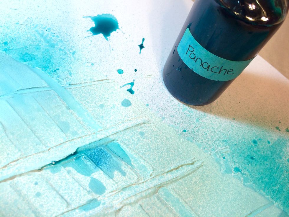 Then, I splatter some Panache Minx Shimmering Inks.