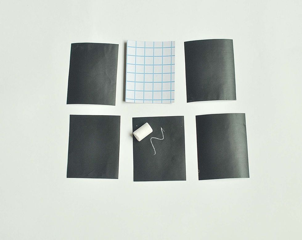 Then I take the paper on which we'll write with chalk. I cut out out squares sized 2.4 in x 2.4 in