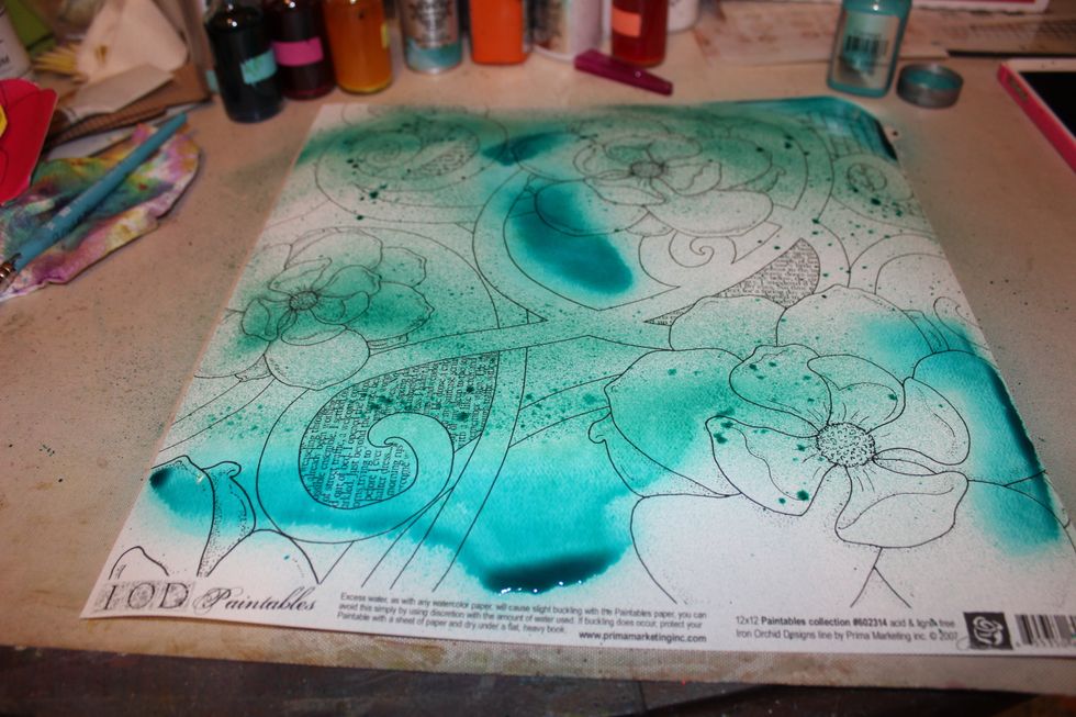 Then I took the 2nd cardstock and I sprayed with Peacock Feathers, Siesta Key, and Concord.