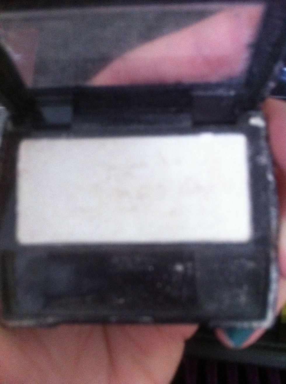 Then I use a pretty bright white to highlight under the brows(: and blend it.