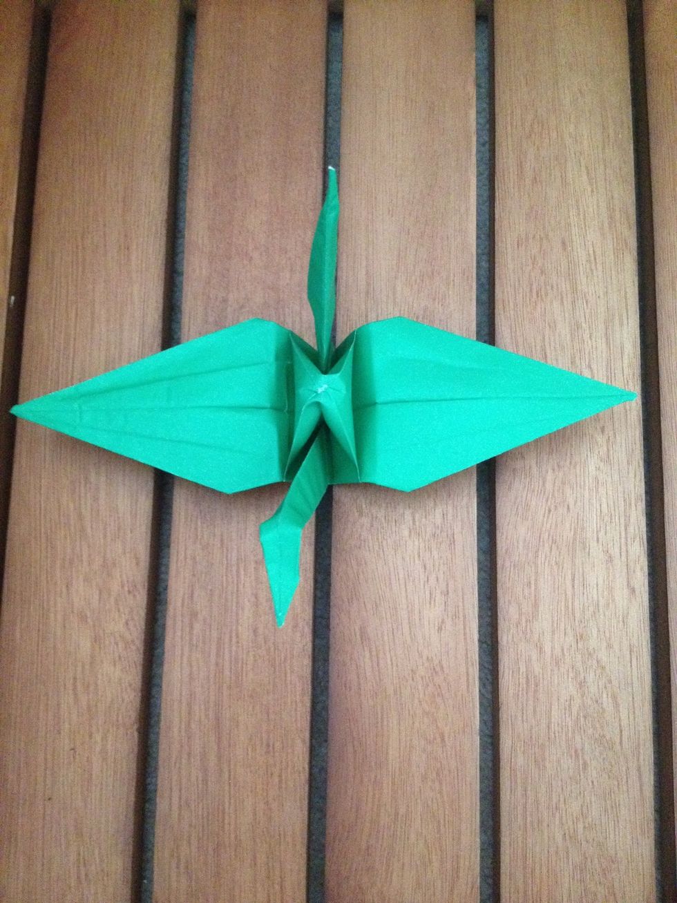 Then, if you want a puffed up body, you need to blow through the tiny hole in the base of the bird. Then gently pull the wings apart and it should 'pop up'.