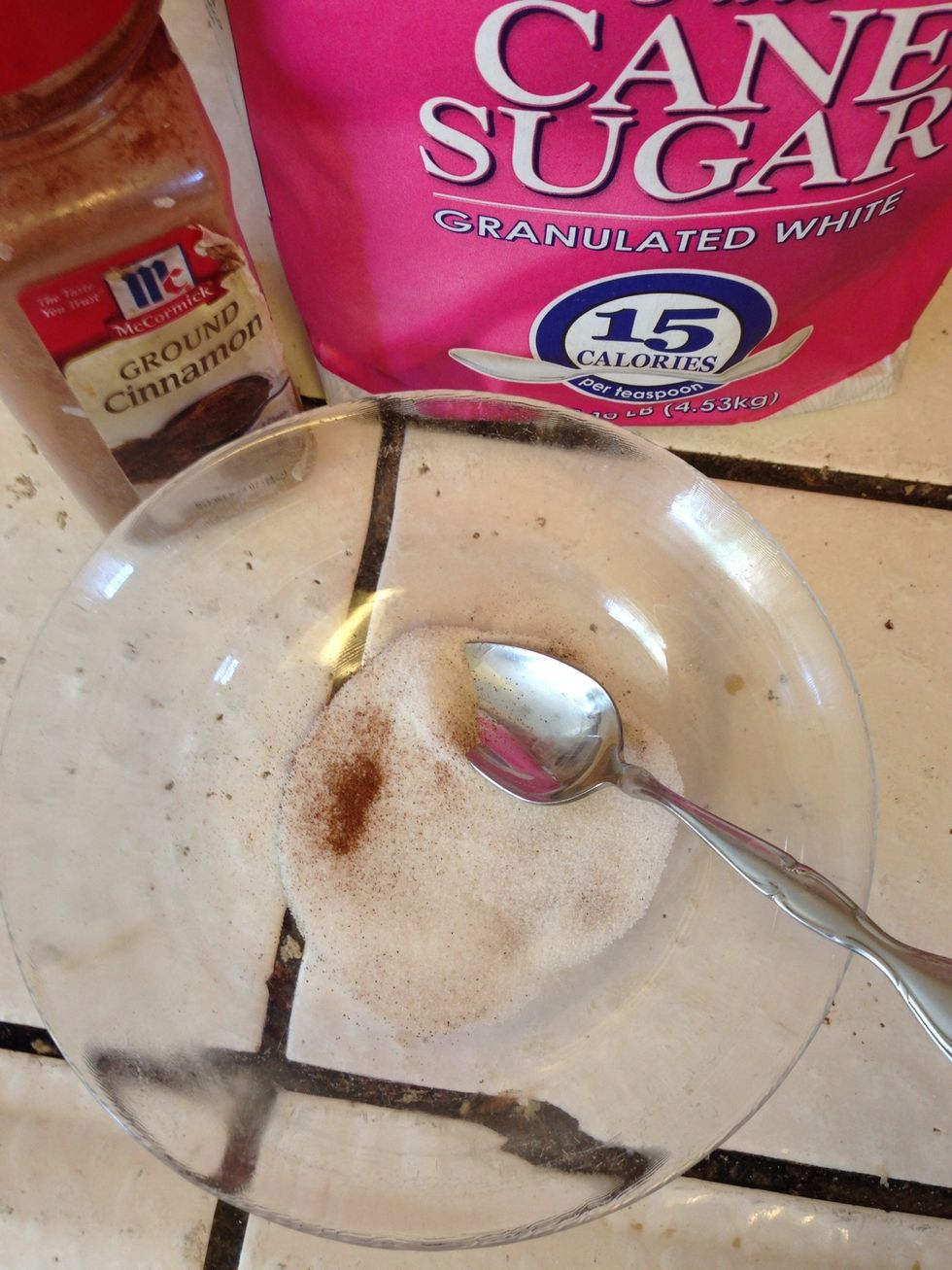 Then in a bowl place about 2 table spoons of sugar and 1/2 a tsp of cinnamon and mix together