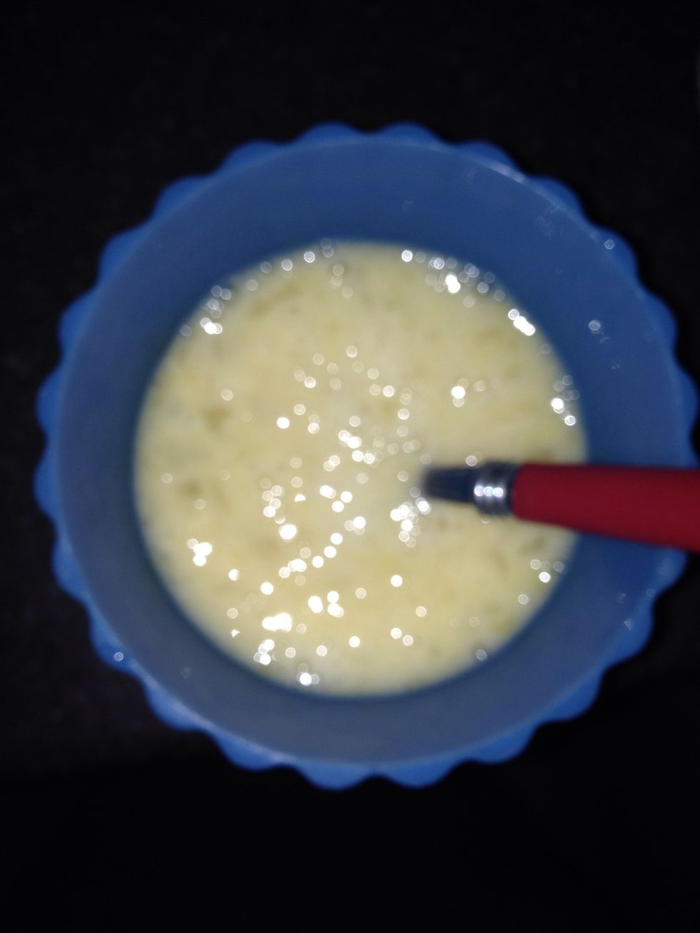 Then in a small bowl whisk the 4 eggs then pour into the mixture of butter and sugar