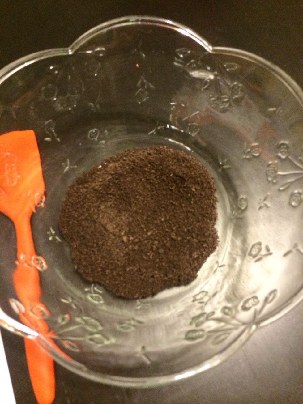 Then in you bowl or you can use a new and cleaned flower pot, add some Oreo crumble to the bottom, this is your dirt