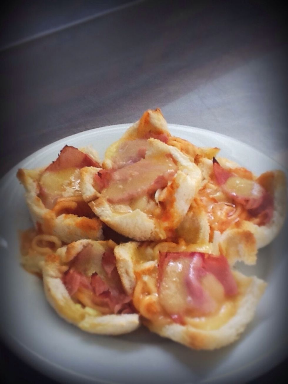 Then insert into the oven for about 8 to 10 minutes, when golden and the cheese is melted they should be finished!!