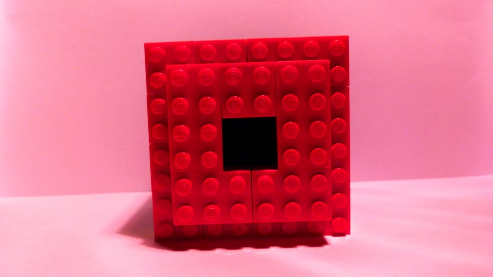 Then insert the bottom 2x2 of "bow" into the center hole of the box.