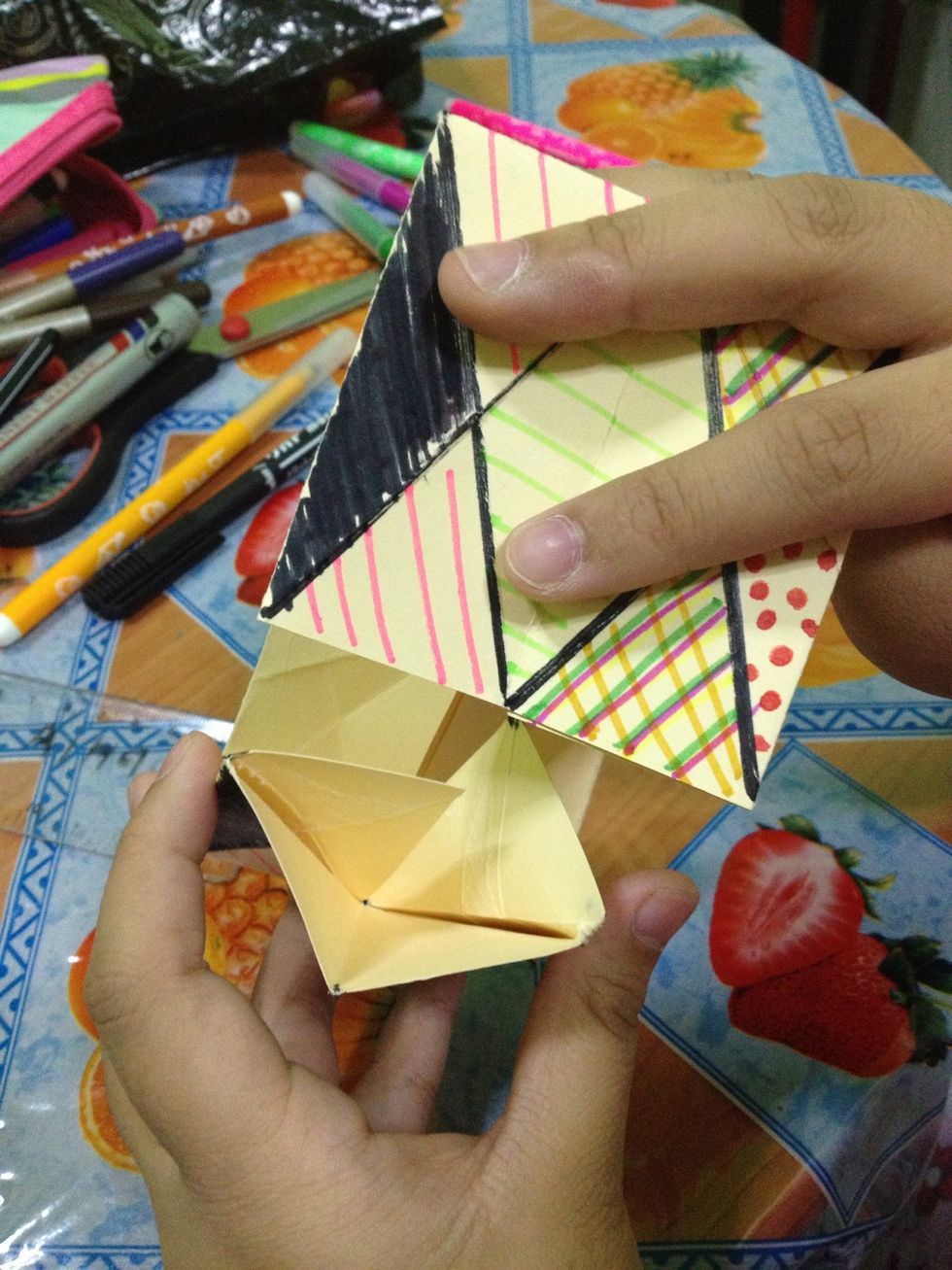 Then insert the right side to the left pocket.