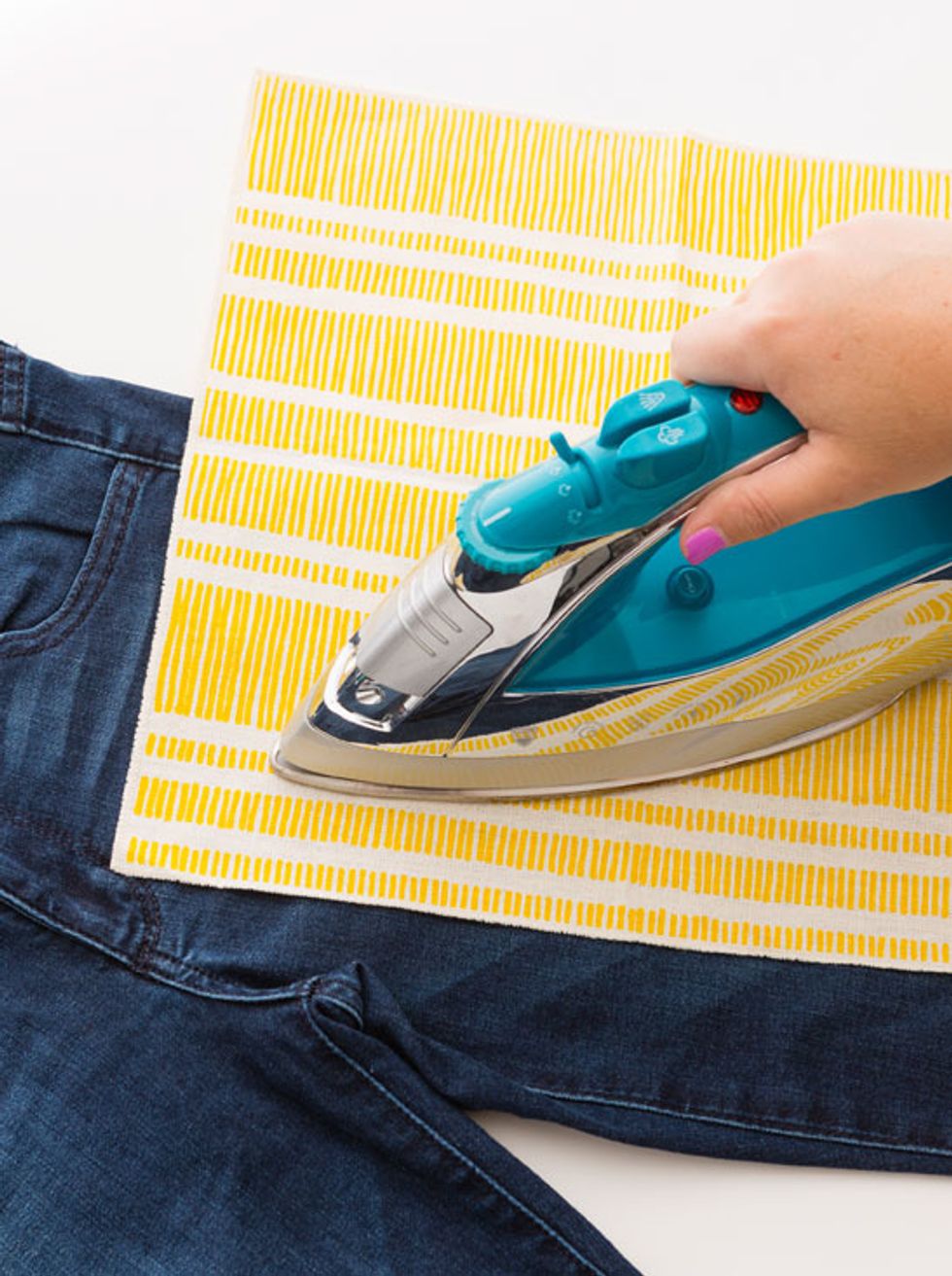 Then, iron on the cotton setting for 10 minutes or so, or until the patches can\u2019t be lifted up at the edges. Let cool completely before wearing.