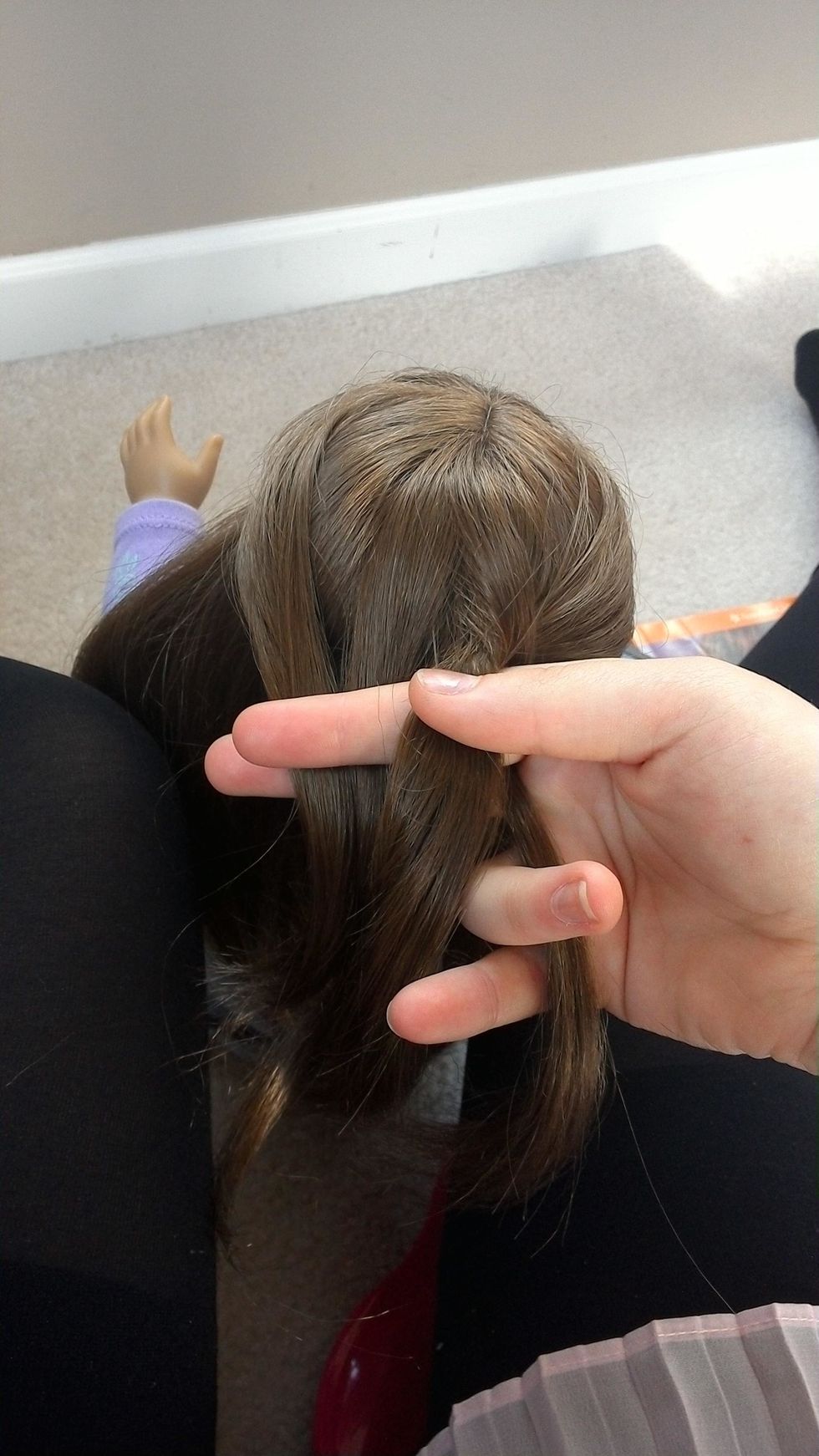 Then join it with the small strand on the farthest left.