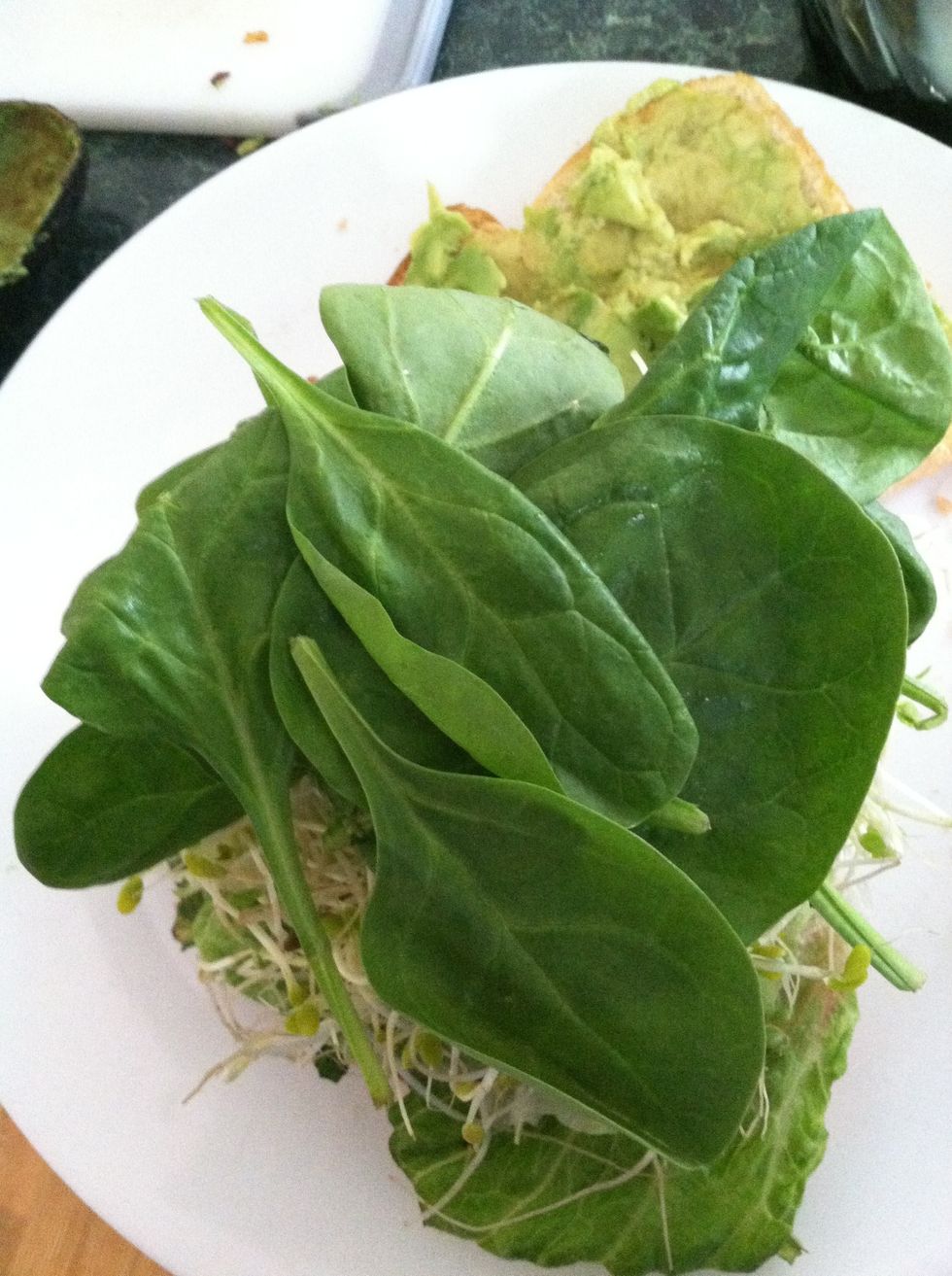 Then lay on the spinach.