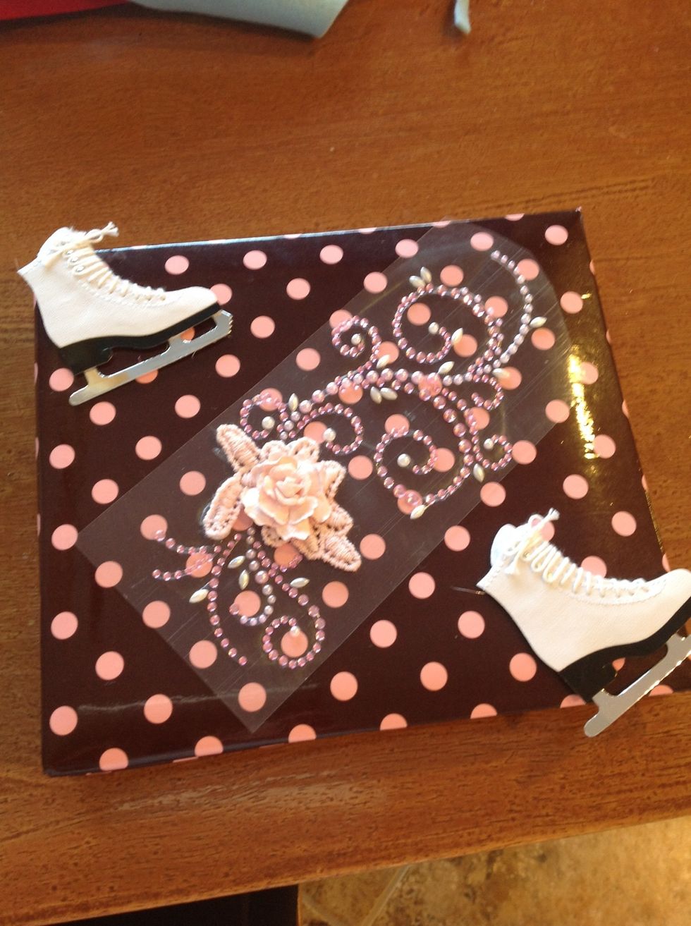 Then, lay out your embellishments before you glue them on.  I am an ice skater, so I used ice skates but you can use anything you want \ud83d\ude0a