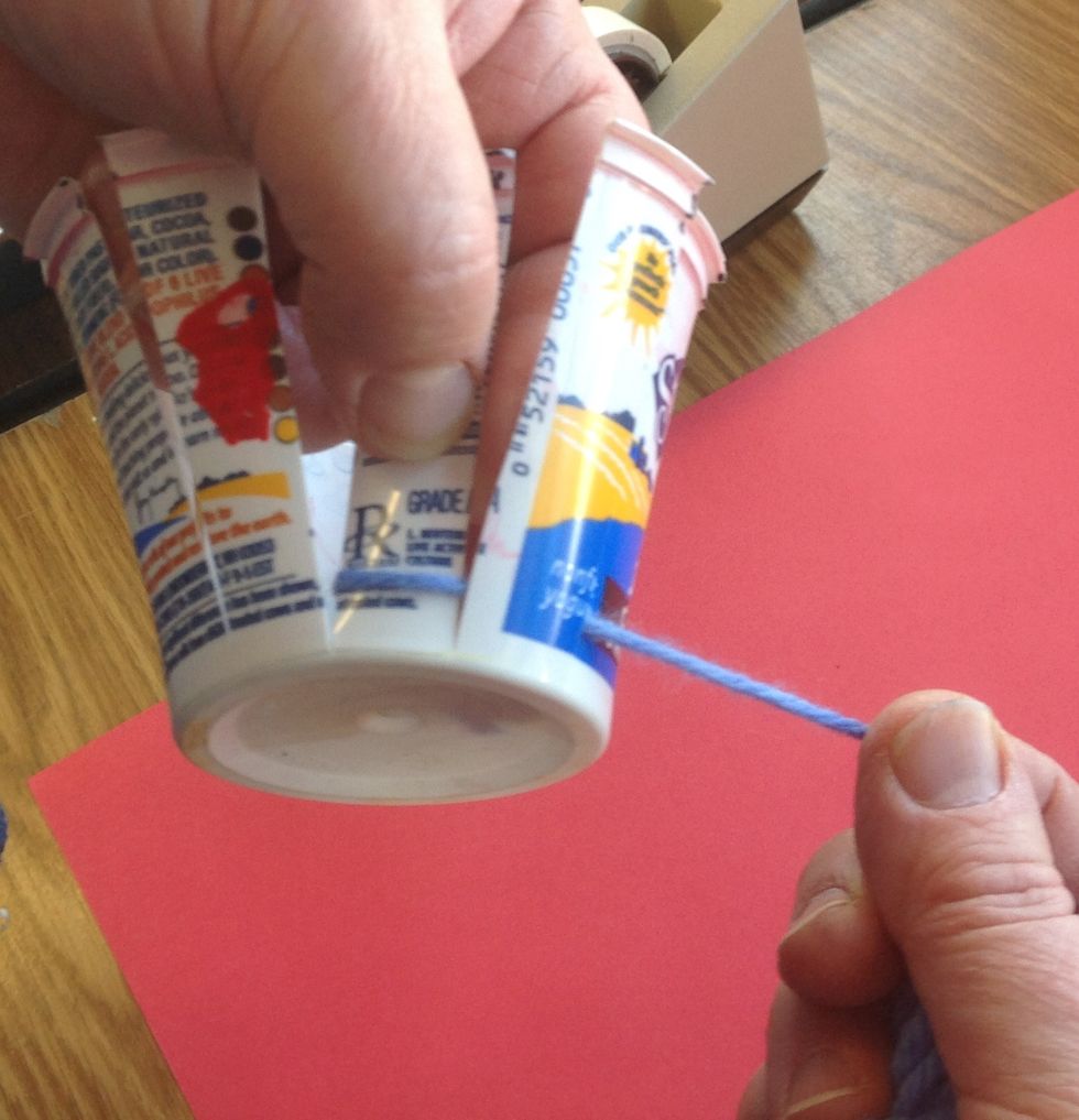 Then lead the yarn BEHIND the next warp. so begins the pattern of in front, behind, in front, behind which continues until you run out of yarn.