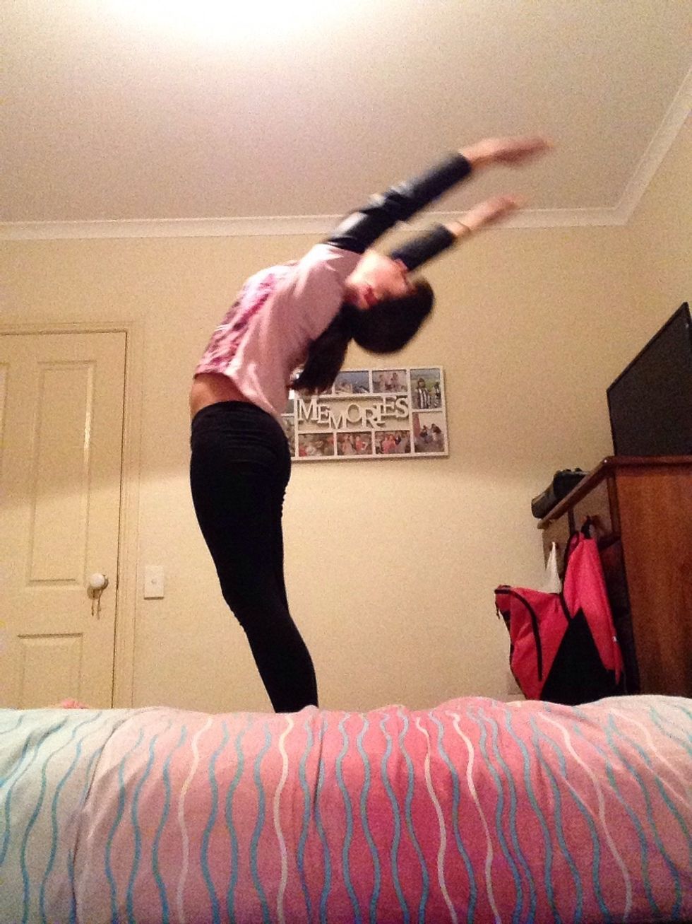 Then lean back with ur arms still on ur ears (ur arms go first u follow them)