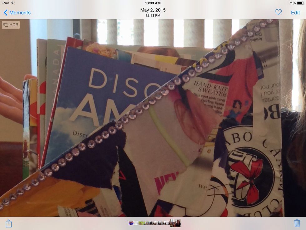 Then let it dry overnight now I'm not done I want to add some purple rhinestones to the edges and voila you have finished your awesome new magazine holder