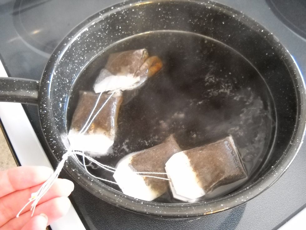 Then let them go to float freely. I hang the knot over the edge of the pot so I can grab it easily later.