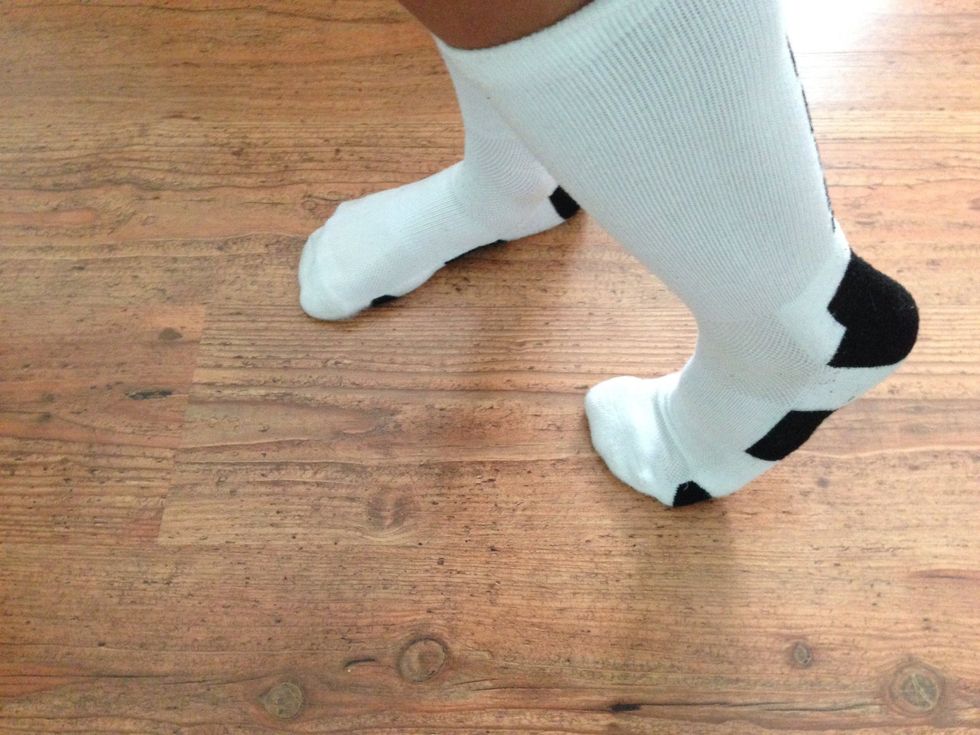 Then lift the heel of the left foot keeping the toes on the ground