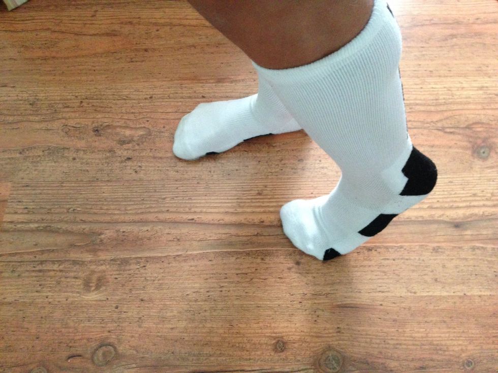 Then lift the heel of the left foot keeping the toes on the ground