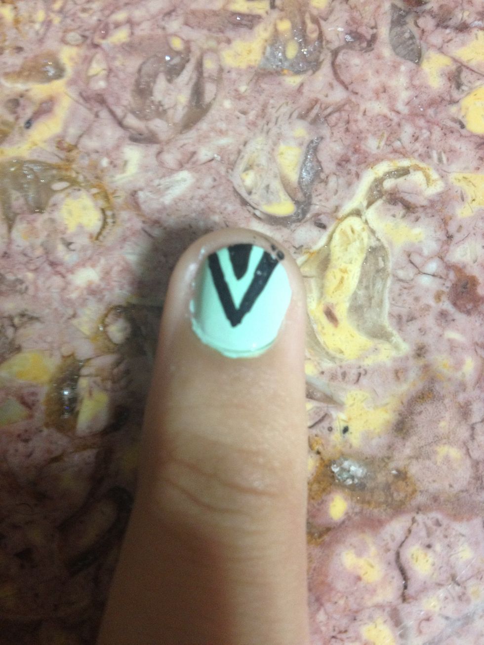 Then make a smaller V inside of the other V and fill that part in.