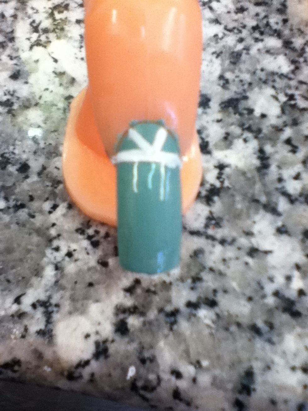 Then make a v on the top of the white line..