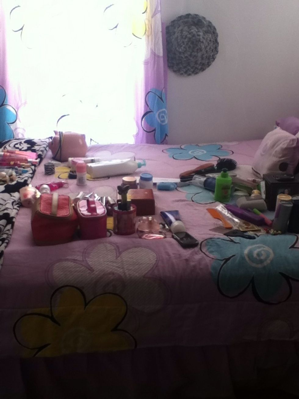 Then make piles on how your going to put your things on your dresser