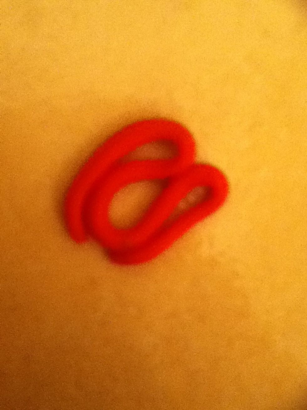 Then make some ketchup by talking red playdoh then rolling it with your fingers then swirling it to make ketchup