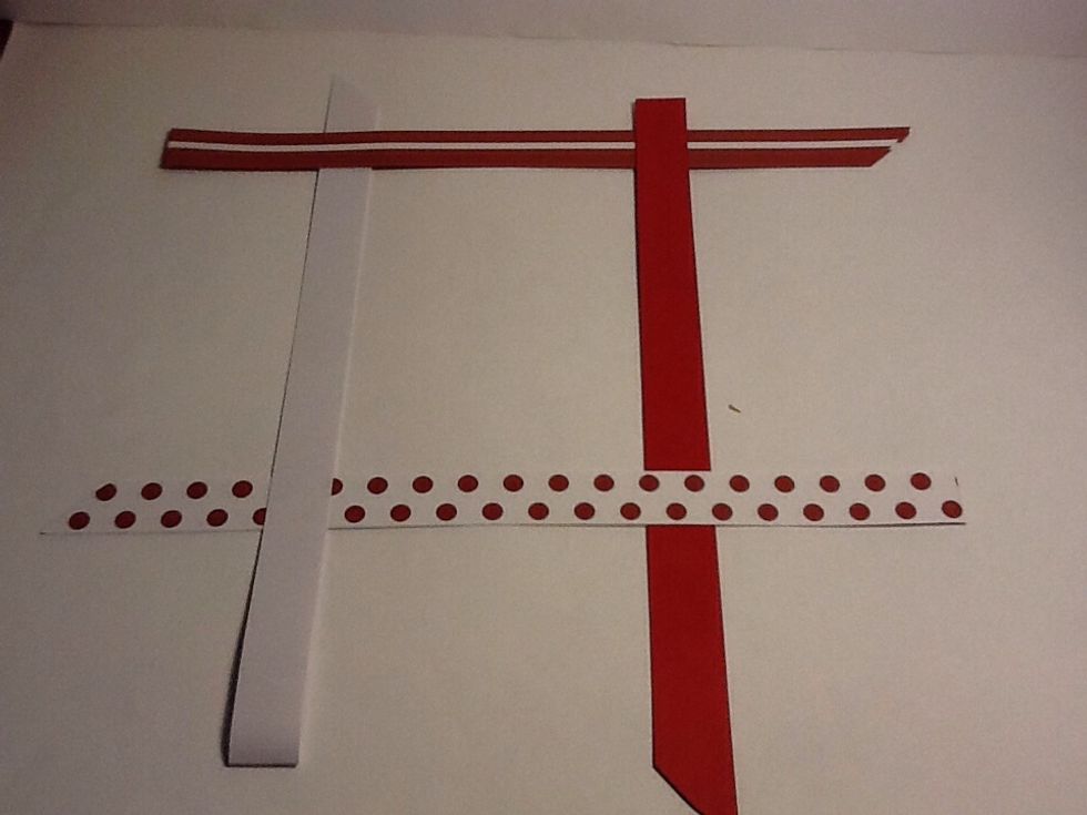 Then make the spotted go though the white and the white through the stripy