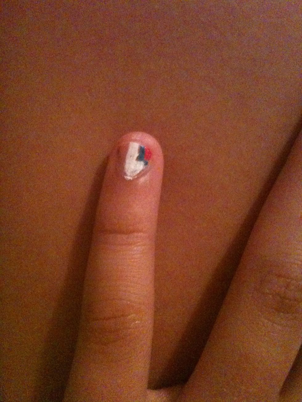Then make the third color pretty big filling in the rest of that half of the nail