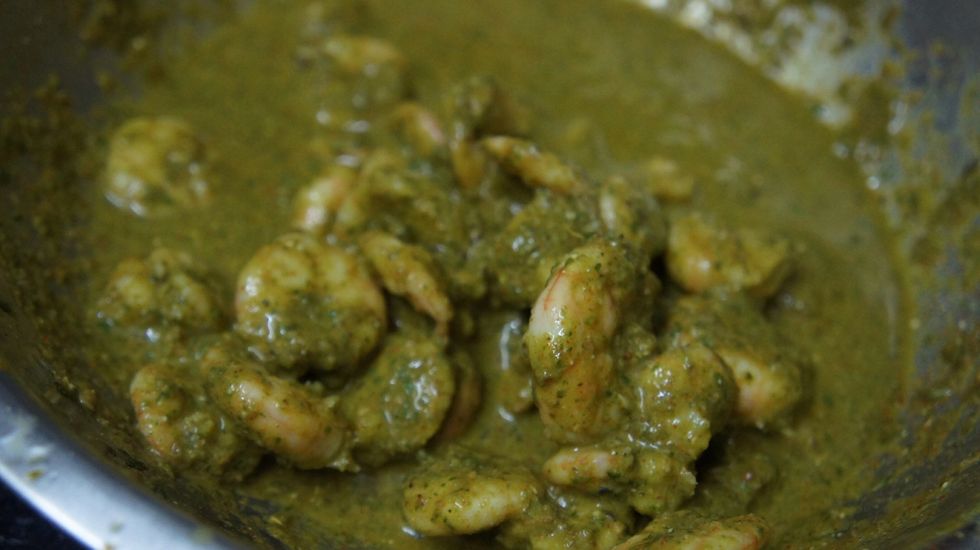 Then marinate with green paste, curd, red chilli powder, salt, garam masala