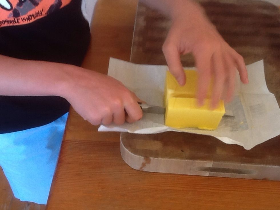Then measure out 85g of butter then melt it in the microwave for 30 seconds.