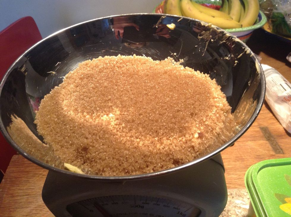 Then measure the soft brown sugar and add into the pan