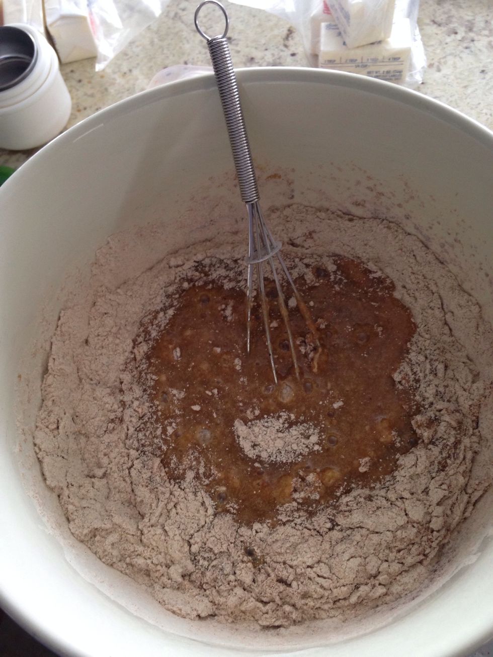 Then mix in the 2 cups of flour, 2 tsp baking soda, 2 tsp baking powder, 1/2 tsp of salt, 2 tsp of ground cinnamon and 1/4 tsp of nutmeg.