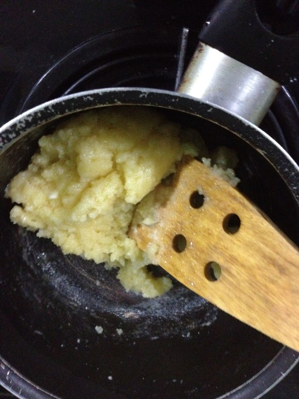 Then mix it, for about 30 seconds with a wooden spoon until it comes together.